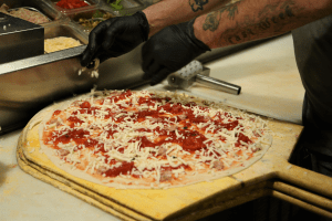 making 575° pizza